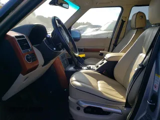 2010 Land Rover Range Rover HSE z VIN SALME1D4XAA318847, wystawiony jako Copart lot #84735474 z przebiegiem 184 777 mil mil oraz Szkoda całkowita • Salvage title. Historia ofert i sprzedaży dostępna na DreamBid. Obrazek 7.