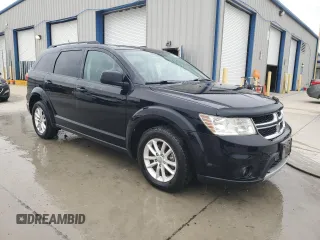 2015 Dodge Journey SXT with VIN 3C4PDDBG0FT660457, listed as a Copart auction lot 54582265 with 164,879 mi miles and Salvage title. Bid and sale history available at DreamBid. Image 4.