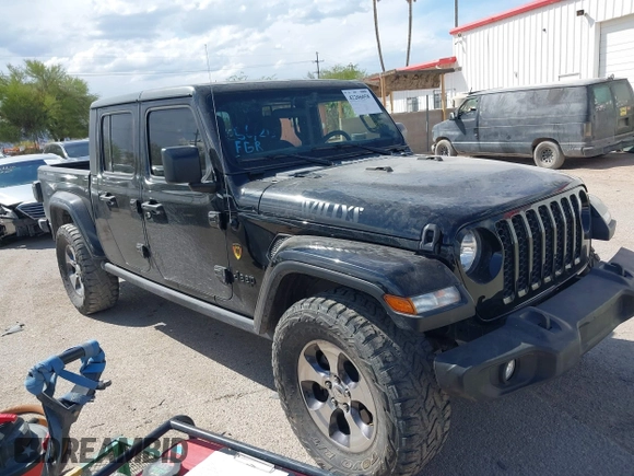 2021 Jeep Gladiator Willys with VIN 1C6HJTAG7ML523718, listed as a IAAI auction lot 42206058 with 48,071 mi miles and . Bid and sale history available at DreamBid. Image 1.