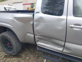 2023 Toyota Tacoma SR with VIN 3TYRX5GNXPT069128, listed as a IAAI auction lot 42007435 with 18,000 mi miles and . Bid and sale history available at DreamBid. Image 6.