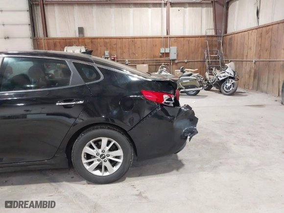 2018 Kia Optima LX with VIN 5XXGT4L30JG233167, listed as a IAAI auction lot 41605135 with 82,337 mi miles. Bid and sale history available at carsss.com. Image 6.