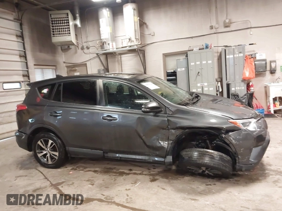 2018 Toyota RAV4 XLE with VIN 2T3RFREVXJW788412, listed as a IAAI auction lot 41931142 with 119,962 mi miles. Bid and sale history available at carsss.com. Image 13.