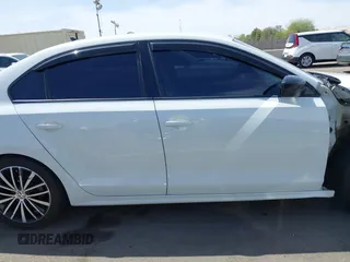 2016 Volkswagen Jetta Sport z VIN 3VWD17AJXGM394402, wystawiony jako IAAI lot #41896331 z przebiegiem 147 771 mil mil oraz . Historia ofert i sprzedaży dostępna na DreamBid. Obrazek 14.