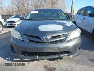 2011 Toyota Corolla L with VIN JTDBU4EE5B9140455, listed as a IAAI auction lot 41748242 with 319,346 mi miles. Bid and sale history available at carsss.com. Image 6.