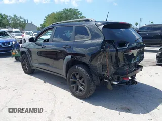 2017 Jeep Cherokee Trailhawk with VIN 1C4PJMBS9HW537962, listed as a IAAI auction lot 42002460 with 129,037 mi miles and . Bid and sale history available at DreamBid. Image 3.