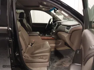 2017 Chevrolet Suburban Premier with VIN 1GNSKJKC0HR250854, listed as a IAAI auction lot 41541476 with 128,231 mi miles. Bid and sale history available at carsss.com. Image 5.