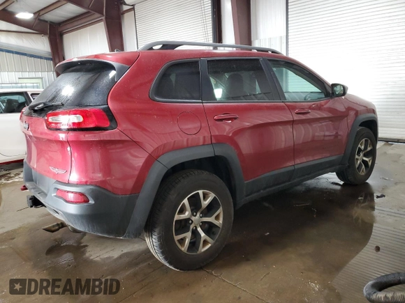 2015 Jeep Cherokee Trailhawk with VIN 1C4PJMBB8FW576765, listed as a Copart auction lot 49097925 with 299,877 mi miles and Clean Title. Bid and sale history available at DreamBid. Image 3.