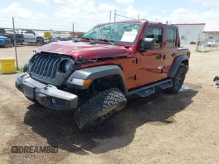2021 Jeep Wrangler Unlimited Sport S with VIN 1C4HJXDN0MW815350, listed as a IAAI auction lot 42416714 with 68,869 mi miles and . Bid and sale history available at DreamBid. Image 2.