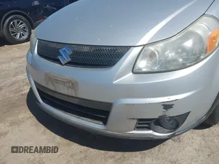 2009 Suzuki SX4 Touring AWD with VIN JS2YB417295100879, listed as a IAAI auction lot 41979405 with 69,625 mi miles and . Bid and sale history available at DreamBid. Image 6.