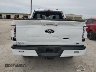 2024 Ford F-150 Lightning Flash z VIN 1FT6W3L77RWG28974, wystawiony jako Copart lot #60819395 z przebiegiem 7 025 mil mil oraz Szkoda całkowita • Salvage title. Historia ofert i sprzedaży dostępna na DreamBid. Obrazek 6.