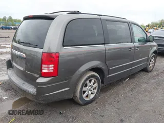 2010 Chrysler Town & Country Touring with VIN 2A4RR5D18AR386942, listed as a IAAI auction lot 42199851 with 143,924 mi miles and . Bid and sale history available at DreamBid. Image 4.