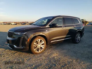 2023 Cadillac XT6 FWD Premium Luxury with VIN 1GYKPCRS7PZ128357, listed as a Copart auction lot 42254795 with 11,648 mi miles and Clean Title. Bid and sale history available at carsss.com. Image 1.