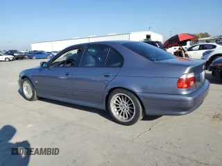 2001 BMW 5 Series 540i with VIN WBADN53421GC96565, listed as a Copart auction lot 83236524 with 149,650 mi miles and Salvage Title. Bid and sale history available at carsss.com. Image 2.