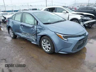 2023 Toyota Corolla Hybrid LE with VIN JTDBDMHE0P3005163, listed as a IAAI auction lot 41631670 with 10,956 mi miles. Bid and sale history available at carsss.com. Image 1.