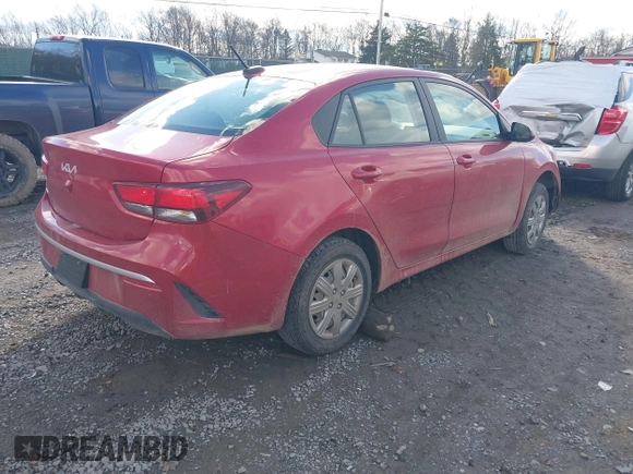 2023 Kia Rio S with VIN 3KPA24AD9PE512896, listed as a IAAI auction lot 41209063 with 32,505 mi miles. Bid and sale history available at carsss.com. Image 4.