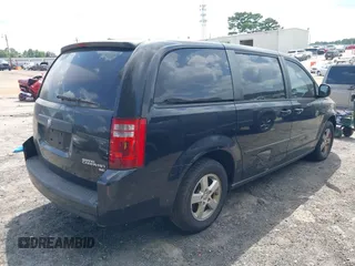 2010 Dodge Grand Caravan SE with VIN 2D4RN4DE2AR339889, listed as a IAAI auction lot 40034624 with 104,896 mi miles and . Bid and sale history available at DreamBid. Image 4.