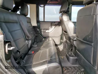2012 Jeep Wrangler Unlimited Altitude with VIN 1C4HJWEGXCL180602, listed as a Copart auction lot 61391095 with 187,205 mi miles and Salvage title. Bid and sale history available at DreamBid. Image 11.