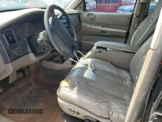 2003 Dodge Dakota z VIN 1D7HG38Z13S220152, wystawiony jako Copart lot #54314515 z przebiegiem Nie podano mil oraz Szkody całkowita. Historia ofert i sprzedaży dostępna na DreamBid. Obrazek 7.