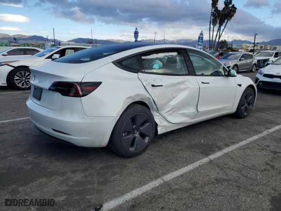 2023 Tesla Model 3 with VIN 5YJ3E1EA7PF579683, listed as a Copart auction lot 87651765 with 9,048 mi miles and Salvage Title. Bid and sale history available at carsss.com. Image 3.