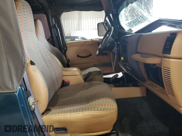 1997 Jeep Wrangler Sport with VIN 1J4FY19SXVP537075, listed as a Copart auction lot 61389915 with Not provided miles and Salvage title. Bid and sale history available at DreamBid. Image 7.