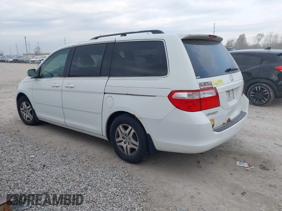 2007 Honda Odyssey EX-L with VIN 5FNRL38607B403903, listed as a IAAI auction lot 42074718 with 148,816 mi miles. Bid and sale history available at carsss.com. Image 3.