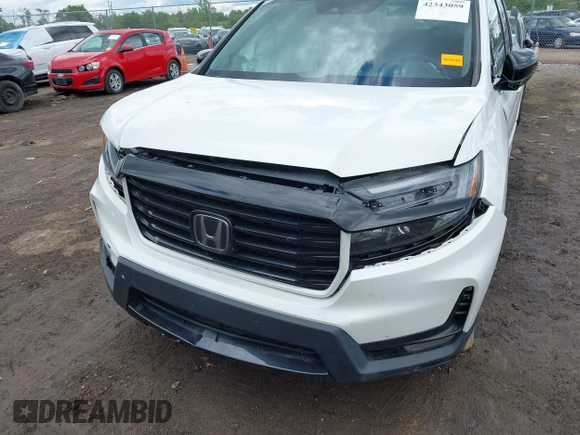 2021 Honda Ridgeline Sport with VIN 5FPYK3F14MB005117, listed as a IAAI auction lot 42343059 with 58,862 mi miles and . Bid and sale history available at DreamBid. Image 6.