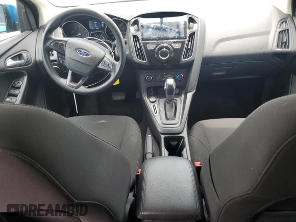 2016 Ford Focus SE z VIN 1FADP3F21GL386580, wystawiony jako Copart lot #63326425 z przebiegiem 82 139 mil mil oraz Szkoda całkowita • Salvage title. Historia ofert i sprzedaży dostępna na DreamBid. Obrazek 8.