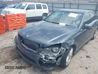 2014 Mercedes-Benz C 250 Sport with VIN WDDGF4HB0EA936265, listed as a IAAI auction lot 42090412 with 113,695 mi miles and . Bid and sale history available at DreamBid. Image 2.