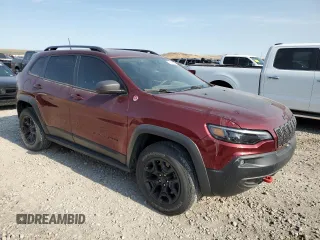 2019 Jeep Cherokee Trailhawk Elite with VIN 1C4PJMBNXKD147403, listed as a Copart auction lot 61609245 with 58,636 mi miles and Clean title. Bid and sale history available at DreamBid. Image 4.
