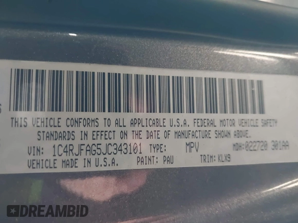 2018 Jeep Grand Cherokee Laredo E with VIN 1C4RJFAG5JC343101, listed as a IAAI auction lot 41211158 with 105,886 mi miles. Bid and sale history available at carsss.com. Image 9.
