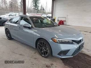 2023 Honda Civic Sport Touring z VIN 19XFL1H83PE008953, wystawiony jako IAAI lot #41829838 z przebiegiem 23 065 mil mil oraz . Historia ofert i sprzedaży dostępna na DreamBid. Obrazek 1.