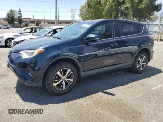 2018 Toyota RAV4 XLE with VIN JTMWFREV6JJ178976, listed as a Copart auction lot 64217705 with 126,123 mi miles and Salvage title. Bid and sale history available at DreamBid. Image 1.