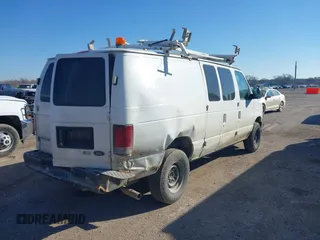 2009 Ford Econoline Cargo with VIN 1FTNE24L89DA84047, listed as a IAAI auction lot 41650399 with 248,505 mi miles. Bid and sale history available at carsss.com. Image 4.