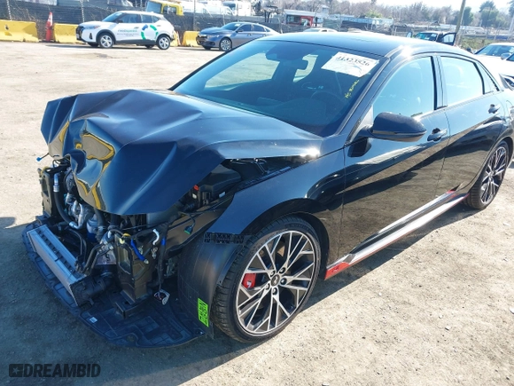 2023 Hyundai Elantra N with VIN KMHLW4AK8PU018635, listed as a IAAI auction lot 41323526 with 8,192 mi miles. Bid and sale history available at carsss.com. Image 18.