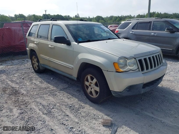 2010 Jeep Grand Cherokee Laredo with VIN 1J4PS4GK6AC136702, listed as a IAAI auction lot 42066484 with 126,509 mi miles. Bid and sale history available at carsss.com. Image 1.