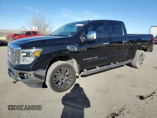 2017 Nissan Titan SL z VIN 1N6BA1F20HN522403, wystawiony jako Copart lot #87477114 z przebiegiem 98 084 mil mil oraz Szkoda całkowita • Salvage title. Historia ofert i sprzedaży dostępna na DreamBid. Obrazek 1.