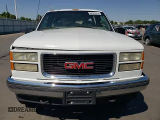 1998 GMC Suburban z VIN 3GKFK16R0WG502287, wystawiony jako Copart lot #62323314 z przebiegiem 181 638 mil mil oraz Szkody całkowita. Historia ofert i sprzedaży dostępna na DreamBid. Obrazek 5.