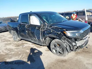 2022 Honda Ridgeline RTL z VIN 5FPYK3F53NB035441, wystawiony jako IAAI lot #41024459 z przebiegiem Nie podano mil oraz . Historia ofert i sprzedaży dostępna na DreamBid. Obrazek 1.