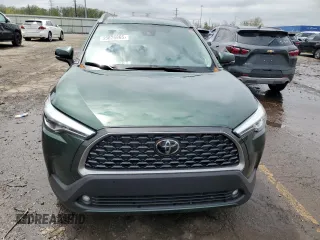 2022 Toyota Corolla Cross XLE with VIN 7MUDAABG6NV006829, listed as a Copart auction lot 55626965 with 23,187 mi miles and Salvage title. Bid and sale history available at DreamBid. Image 5.