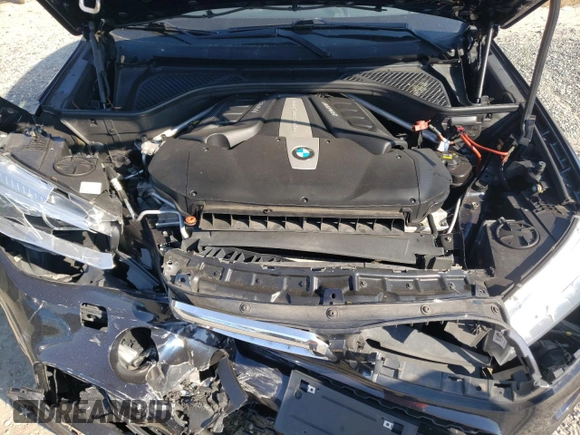 2015 BMW X6 xDrive50i with VIN 5UXKU6C50F0F94199, listed as a Copart auction lot 70680312 with 106,650 mi miles. Bid and sale history available at carsss.com. Image 12.
