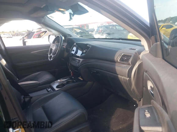 2022 Honda Pilot Special Edition with VIN 5FNYF5H25NB026414, listed as a IAAI auction lot 42590493 with 26,600 mi miles and . Bid and sale history available at DreamBid. Image 5.