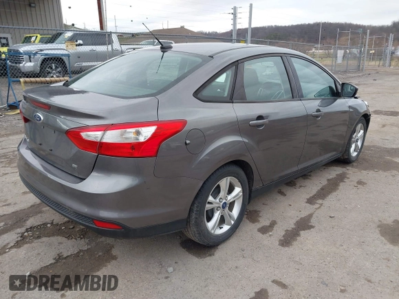 2014 Ford Focus SE with VIN 1FADP3F24EL105899, listed as a IAAI auction lot 41840399 with 90,074 mi miles. Bid and sale history available at carsss.com. Image 4.