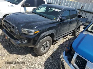 2020 Toyota Tacoma SR5 with VIN 3TMCZ5AN0LM334699, listed as a Copart auction lot 56485535 with 61,203 mi miles and Salvage title. Bid and sale history available at DreamBid. Image 1.