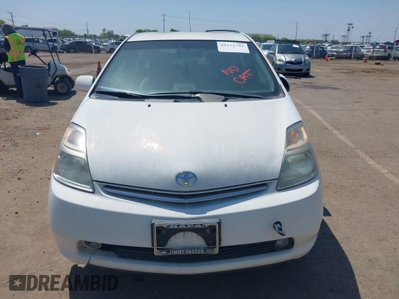2007 Toyota Prius with VIN JTDKB20U577650008, listed as a IAAI auction lot 42171792 with 180,466 mi miles and . Bid and sale history available at DreamBid. Image 6.