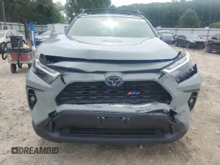 2023 Toyota RAV4 Hybrid XLE Premium with VIN JTMB6RFV8PD097109, listed as a Copart auction lot 59970995 with 43,197 mi miles and Salvage title. Bid and sale history available at DreamBid. Image 5.