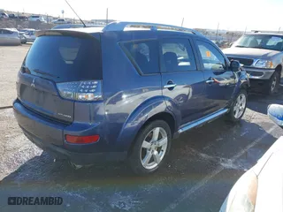 2009 Mitsubishi Outlander XLS with VIN JA4MT41X39Z014800, listed as a IAAI auction lot 41439444 with 1 mi miles. Bid and sale history available at carsss.com. Image 4.