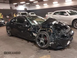 2013 Scion FR-S z VIN JF1ZNAA10D2731484, wystawiony jako IAAI lot #42308810 z przebiegiem 104 032 mil mil oraz . Historia ofert i sprzedaży dostępna na DreamBid. Obrazek 1.
