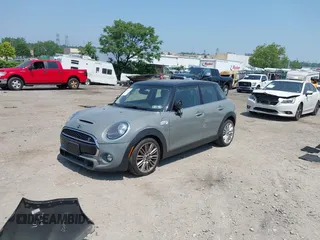 2019 MINI Hardtop 4 Door Cooper S with VIN WMWXU3C57K2H54547, listed as a IAAI auction lot 42492037 with 74,657 mi miles and . Bid and sale history available at DreamBid. Image 18.