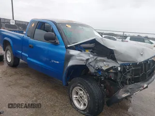 1998 Dodge Dakota SLT z VIN 1B7GG22YXWS683170, wystawiony jako IAAI lot #41903787 z przebiegiem Nie podano mil oraz . Historia ofert i sprzedaży dostępna na DreamBid. Obrazek 1.
