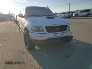 2000 Ford F-150 XL with VIN 1FTRX18L3YKA09007, listed as a Copart auction lot 42828005 with 218,563 mi miles and Salvage Title. Bid and sale history available at carsss.com. Image 11.